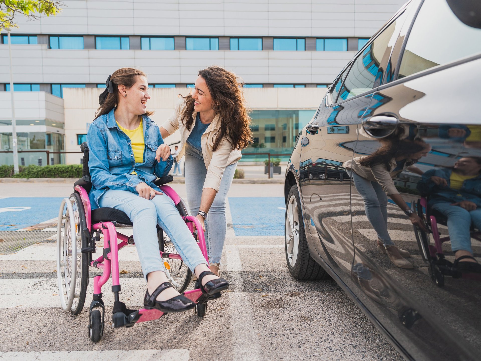 Caregiver and person with disability sharing a warm moment